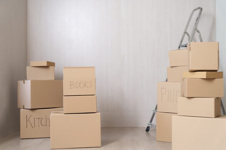 Used cardboard boxes after the move in the concept of "What to Do With Packing Materials After Moving House to Romford'.